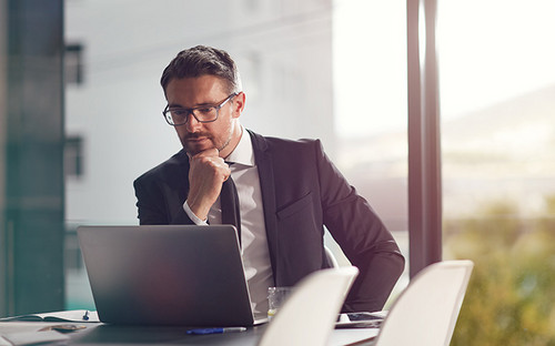 Man sitting on a laptop